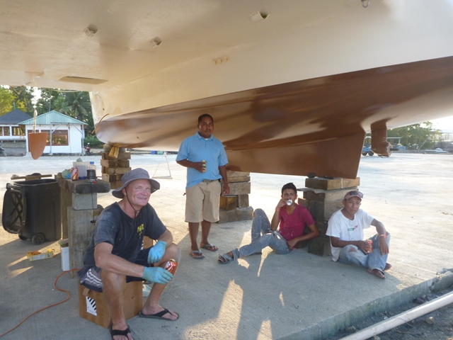 Enjoying a cold one with Arney, Jesus & Hector after working all day applying the Copper coat