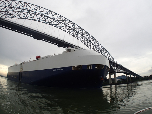 The huge ship Glovis Composer and her crew passed, waving goodbye